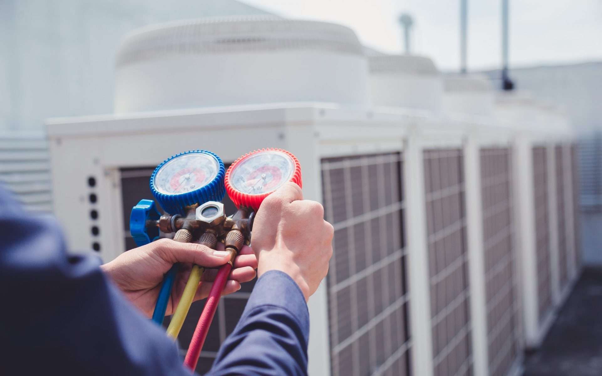 HVAC Technician with Gauges